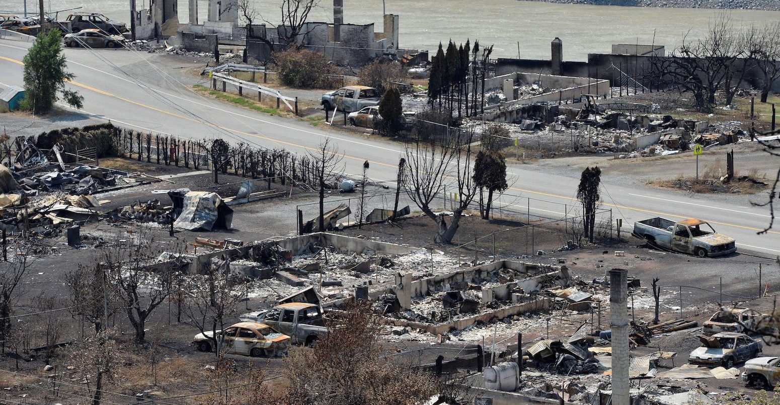 The charred remnants of buildings destroyed by a wildfire in Lytton, Canada.