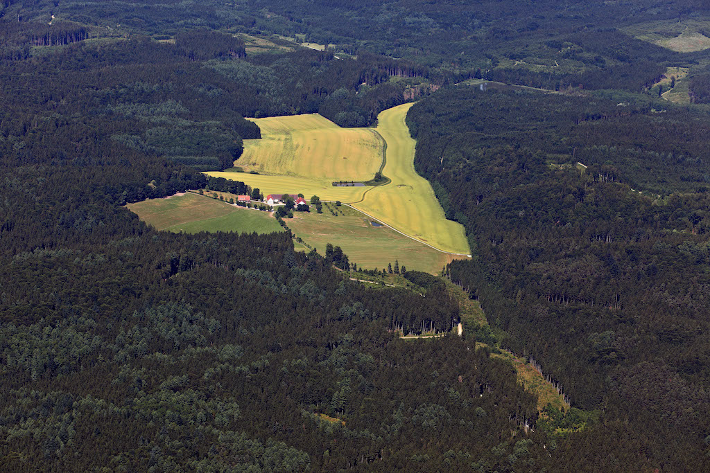 An aerial view of a farmhouse clearing in Germany.