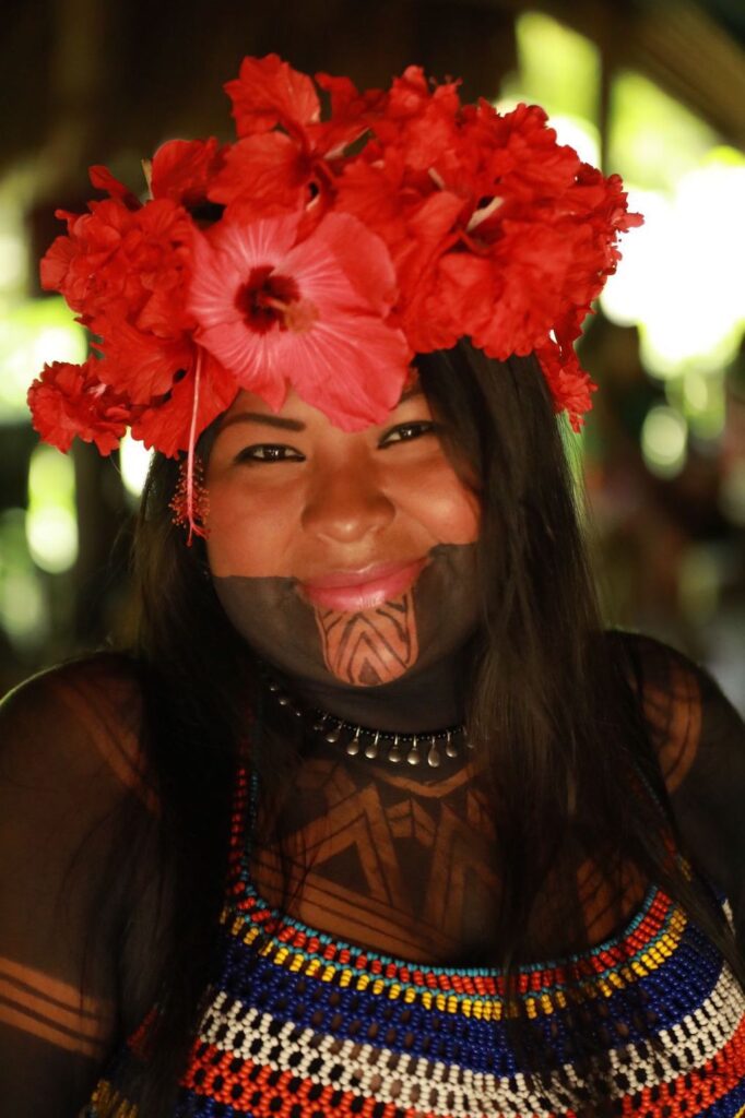 Sara Omi, wearing the traditional clothing and body paint of the Emberá people, which is extracted from the Genipa Americana fruit, known as 