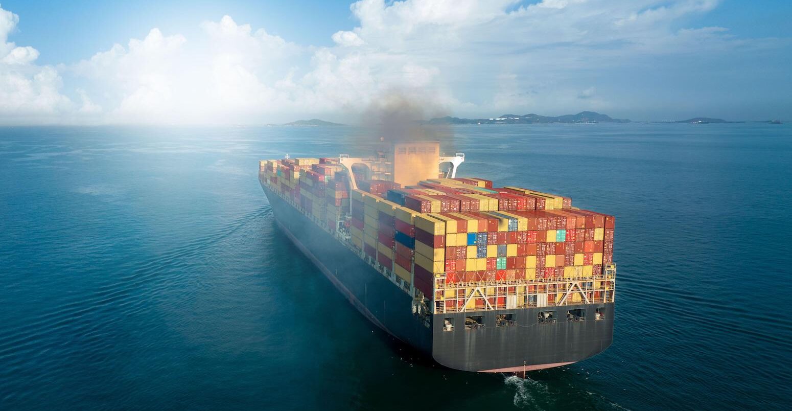 A large cargo ship in motion.