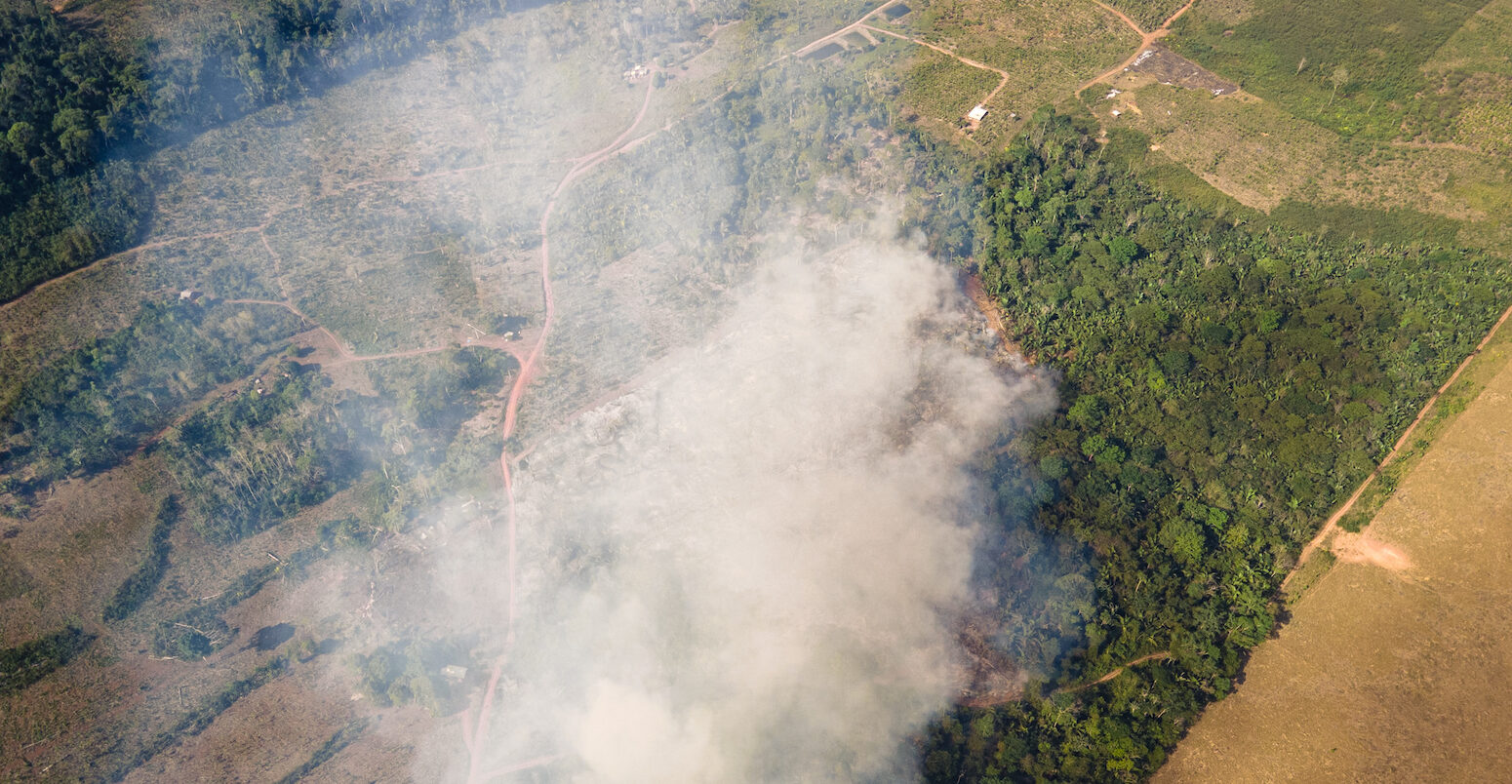 A drone shot of a fire in the Amazon forest.