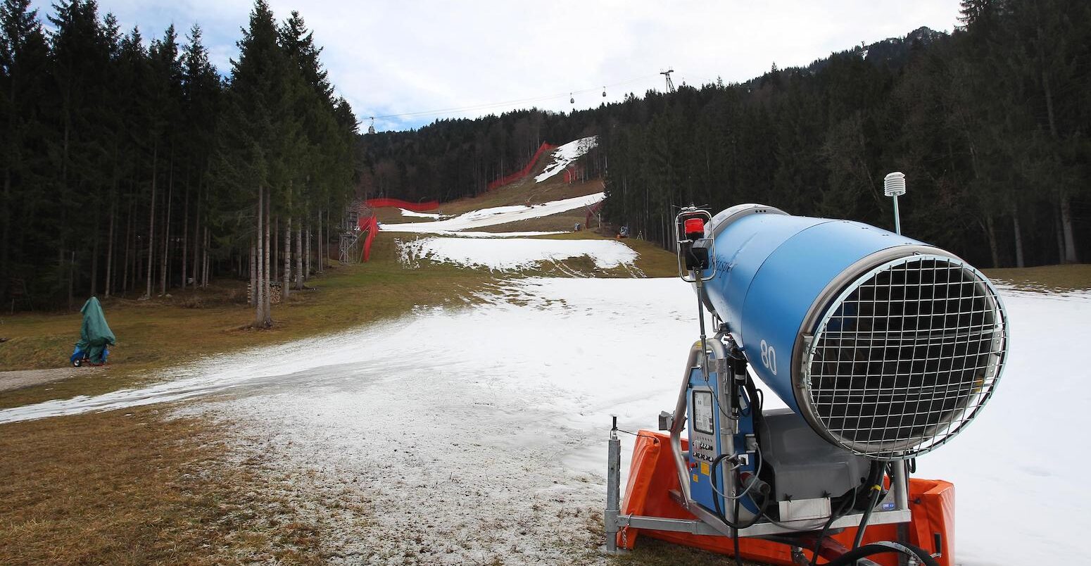 A snow gun stands on the periphery of the Kandahar ski slope in Garmisch-Partenkirchen, Germany.