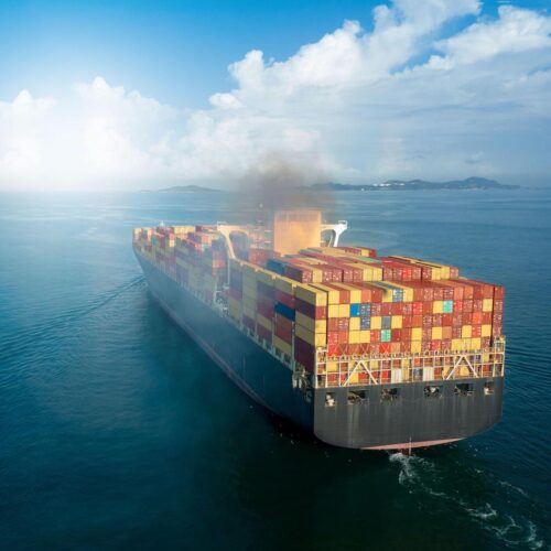 A large cargo ship in motion.